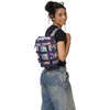 image:imageJanSport Mini Skip Pack  Compact Backpack with Main Compartment Side Water Bottle Pocket and Zippered Accessory Pocket Red TapeMelted Blooms Yellow