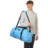 image:imageJanSport Weekender Large Duffel  Travel or Gym Bag Durable Weekender with Front Utility Pocket amp Side Grab Handles  BlackElectric Azul