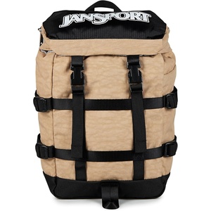 image:imageJanSport Mini Skip Pack  Compact Backpack with Main Compartment Side Water Bottle Pocket and Zippered Accessory Pocket Red TapeTravertine
